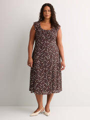 Leaf-Print Sleeveless Midi Dress with Ruffled Empire Waist - Addition Elle